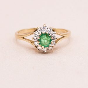 Junkyard Gem 9ct Gold Vintage Emerald and Diamond Halo Ring
